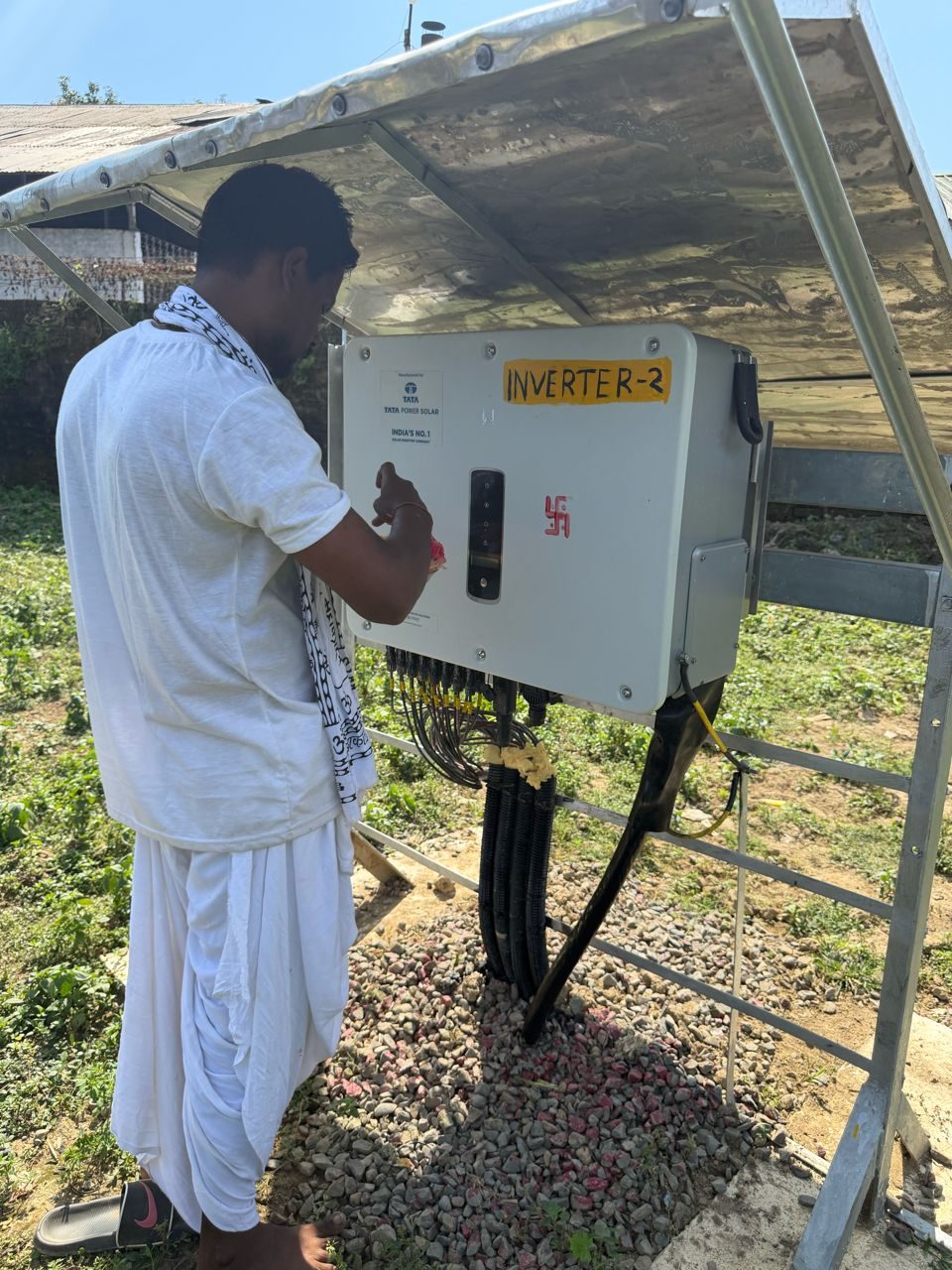 Puja at Inverter-2 of the 230 kWp Borpatra Tea Estate solar plant installed by Arrays Ingenieria
